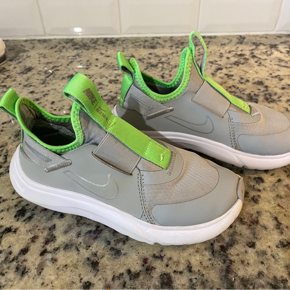 Kids gray/green Nike shoe